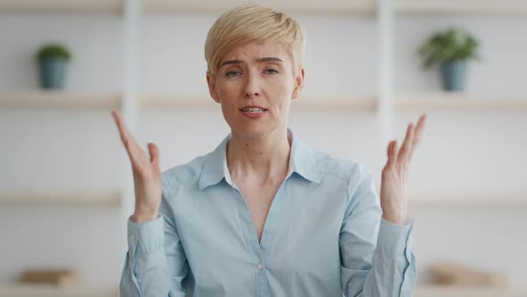 Webcam Pov Portrait of Emotional Middle Aged Woman Talking to Camera Complaining About Problems of