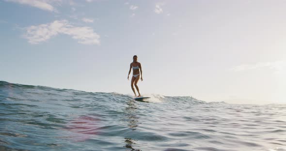 Woman surfing gracefully