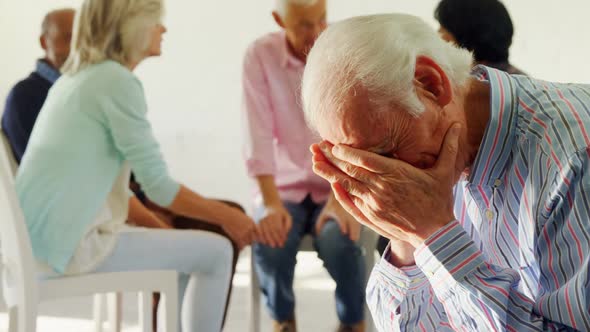 Senior man sitting at health center 4k