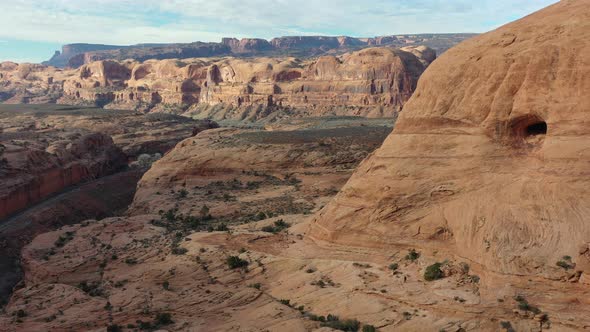 Aerial forwarding shot over picturesque famous grand canyon of Colorado river with red sandstone roc