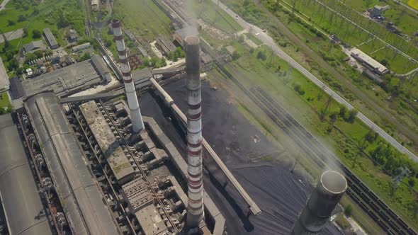 Chimneys of a Thermal Power Plant. Shooting From the Height of an Energy Object Running on Fossil