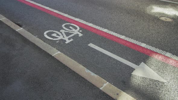 Asphalt Pavement with Marked Bike Path Nearby in Ljubljana