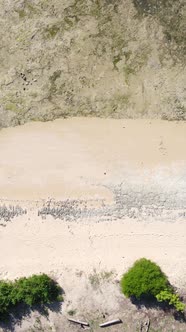 Vertical Video of Low Tide in the Ocean Near the Coast of Zanzibar Tanzania