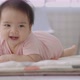 Slow Motion Happy Asian Baby Crawls In The Living Room. Infant Baby Plays with Family. - VideoHive Item for Sale