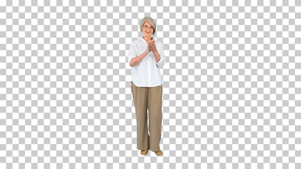 Smiling applauding old woman in glasses, Alpha Channel