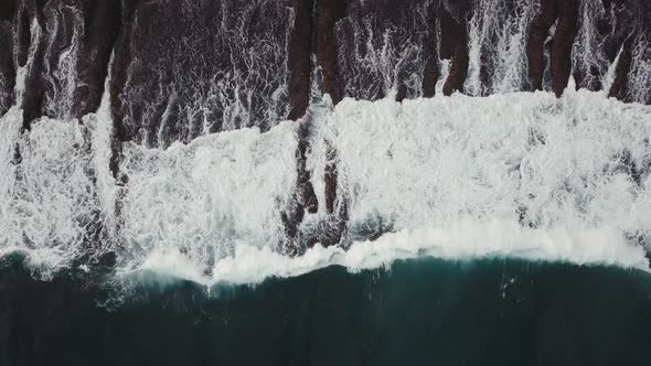 Waves Breaking Over a Shallow Reef