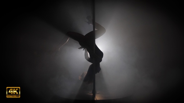 Sexy Women Cinematic Pole Dancing in Smokey Enviroment