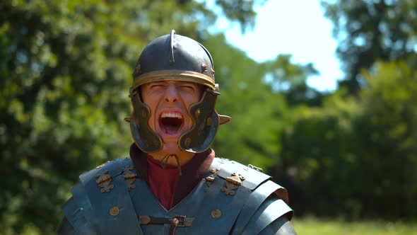 Angry Roman soldier screaming , ultra slow motion