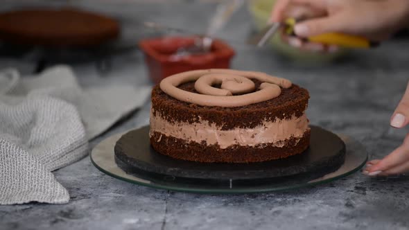 Pastry Chef Making Chocolate Cake in Bakery Shop