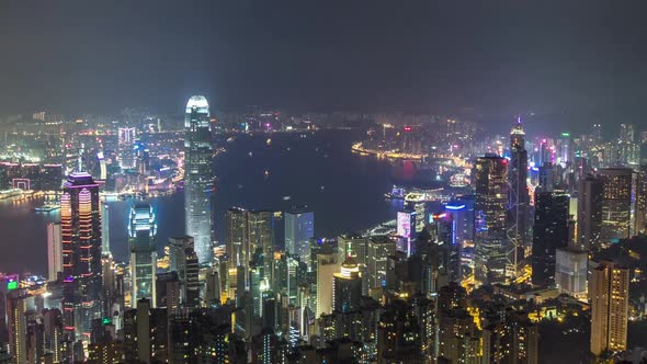 Hong Kong City Skyline Aerial Timelapse at Night with Victoria Harbor and Skyscrapers