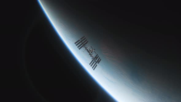 Animation of the International Space Station ISS Floating in Orbit Above Planet Earth in Outer Space alt