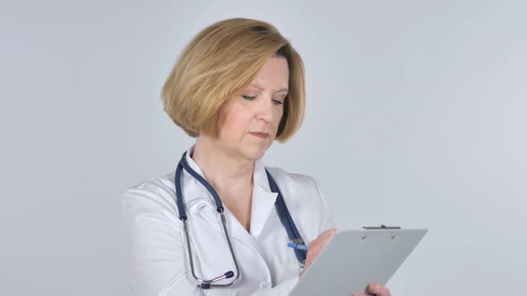 Doctor Busy Writing Treatment on White Background