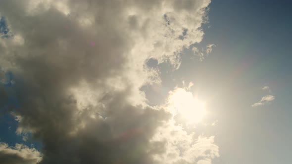 Blue Sky with Sun and Clouds Time Lapse