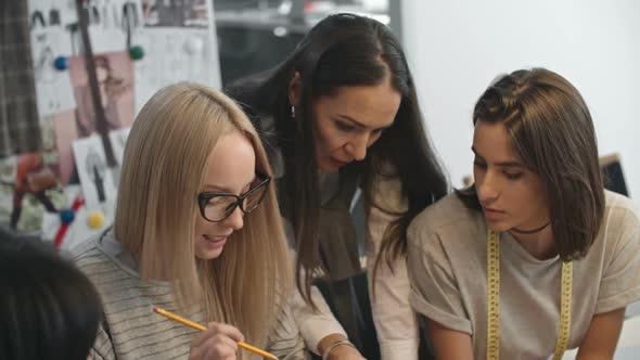 Designers Working Together in Fashion Studio