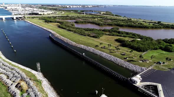 A Boat Travels Through the Canaveral Lock into Port Canaveral, Florida.