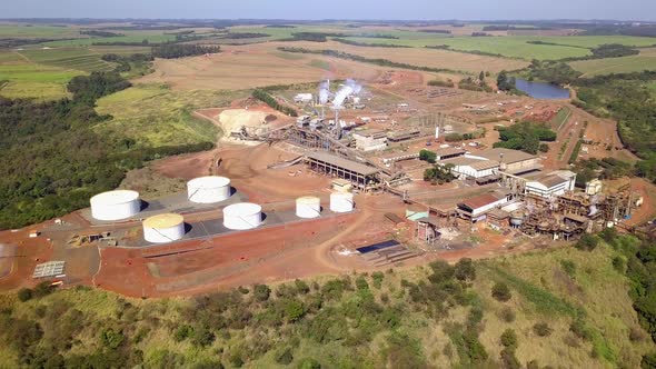 Orbiting aerial of sugarcane methanol plant in Brutas, Sao Paulo