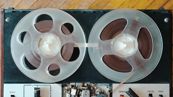 Closeup of an Old Reeltoreel Tape Recorder That is Playing