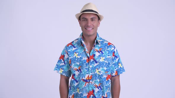 Young Happy Hispanic Tourist Man Smiling