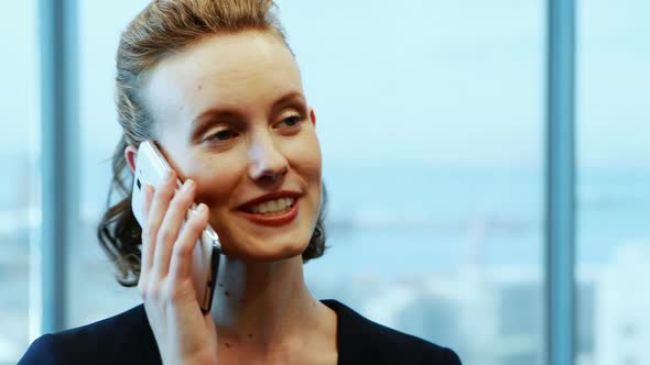 Businesswoman talking on mobile phone