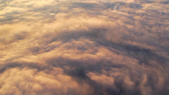 4K Sun is rising above sea of clouds until the horizon