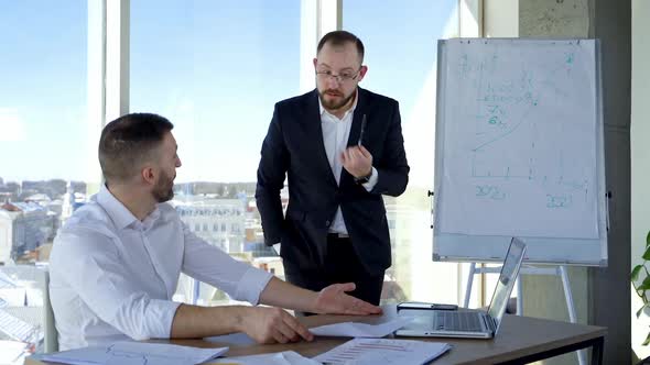 Colleagues at modern coworking office