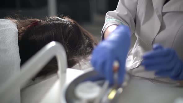 Doctor Puts Injections Into the Scalp