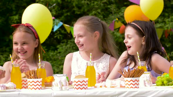Happy Kids on Birthday Party at Summer Garden 