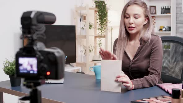 Social Media Star Making a Book Review for Her Audience