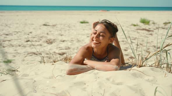 Portrait of Beautiful Young Mixed Race Woman Cheerful Enjoying Lifestyle on Calm Sunny Sandy Beach