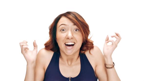 Surprised Young Beautiful Girl Smiling Over White Background