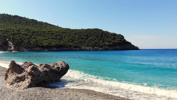 Beautiful Beach of Evia Island, Greece. Sea Bay with Turquoise, Blue Water at the Foot of the Cliffs