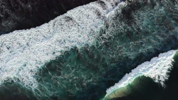 Big Waves Rolling From Above, Top Down Drone View on Blue Turquoise Ocean, Breaking Waves, Whitewash