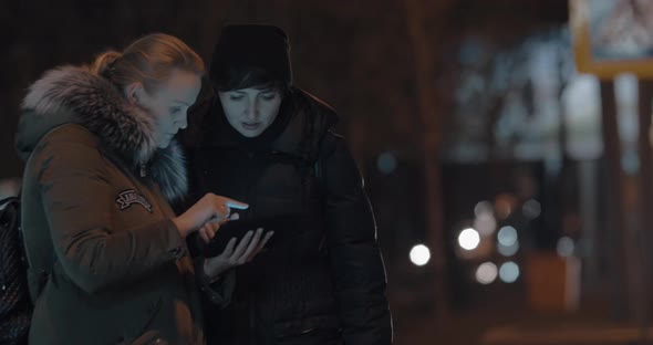 Women with pad in night big city