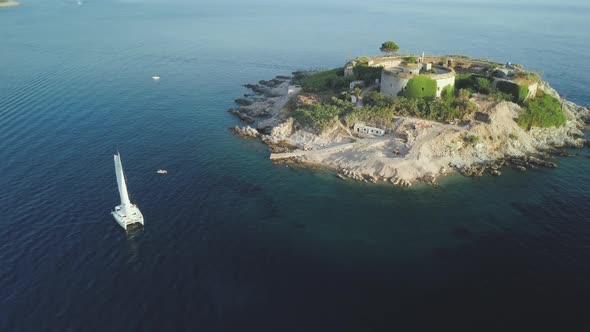 Aerial view of  island with an abandoned fortress in the middle of the sea in Montenegro.