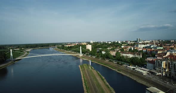 Aerial view of Osijek harbour along Drava river with Pjesacki bridge, Croatia.
