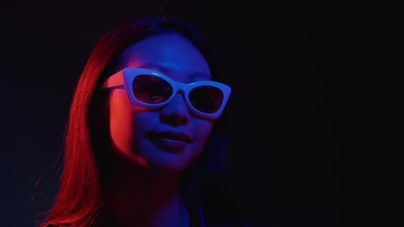 Neon Light Face Clubber Lifestyle Girl in Glasses