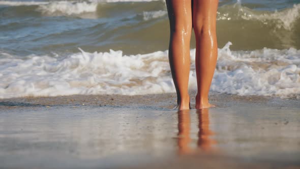 Girl Feet Washed By Sea Waves, Close-up