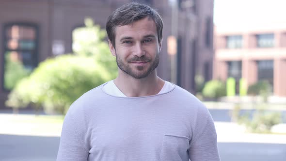 Yes, Positive Handsome Man Accepting Offer by Shaking Head