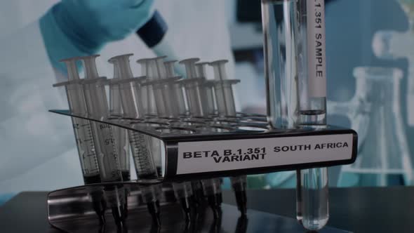 Beta B.1.351 South Africa Variant Test Tube Samples Being Placed In Angled Rack. Locked Off