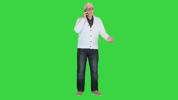 Angry Senior Man Making a Call on a Green Screen Chroma Key