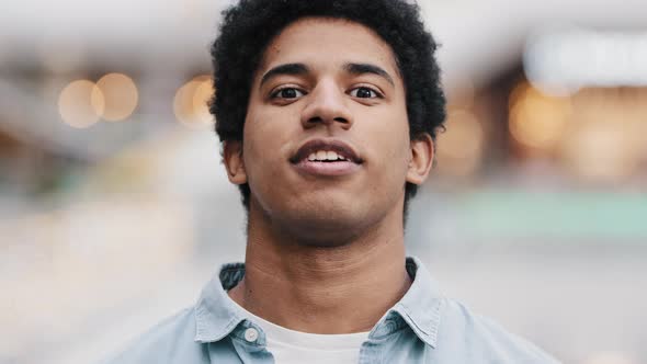 Portrait Male Masked Face African American Guy Man Taking Off Medical Mask Smiling Looking at Camera