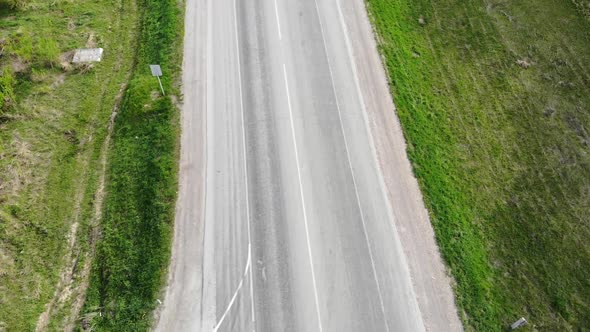 Road for Cars Aerial View From Top Around Green Nature