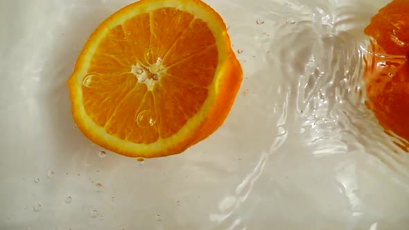 Oranges Falling Into the Water 4