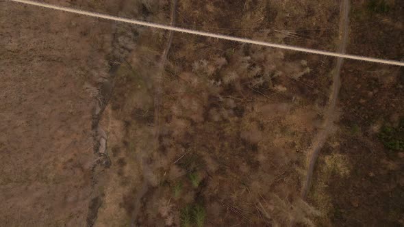 Top down aerial fly over revealing an expansive and long suspension bridge in south west Germany on