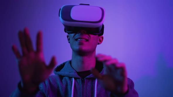 Young gamer playing to new video games with virtual reality experience