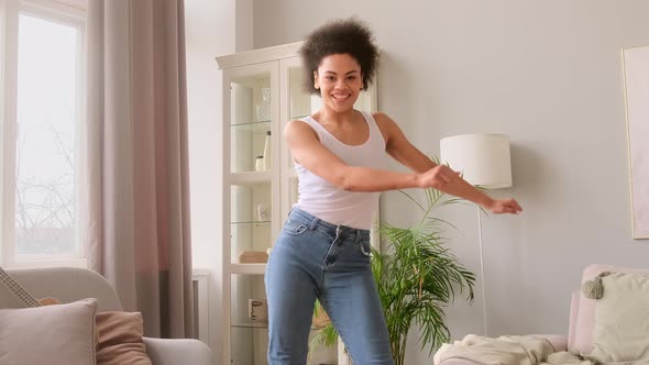 African american black influencer woman blogger recording trendy dance video for social media