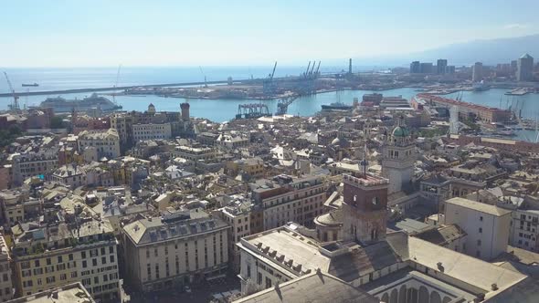 Aerial panoramic drone view of buildings and streets surrounding Port of Genoa.Old famous city of It