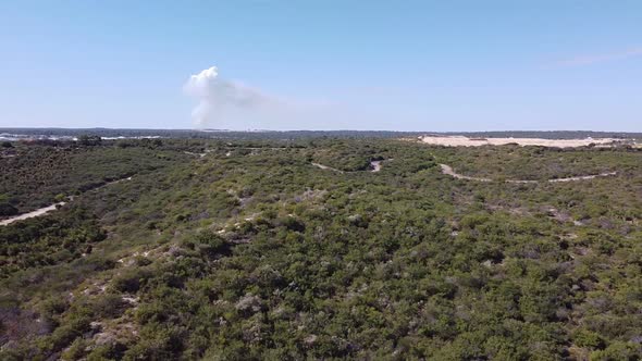 Sand Dune Reserve Pan Left Clip With BushFire In Background, Perth