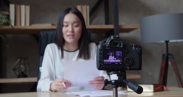 Happy Chinese Vietnamese Woman Blogger Recording Educational Video