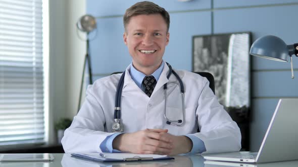 Portrait of Smiling Doctor in Clinic